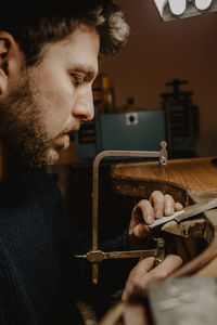 Portrait of young man looking at camera