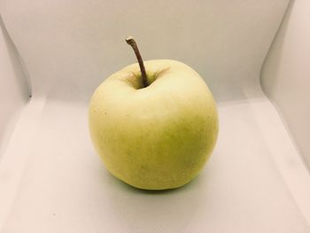 High angle view of apple on table