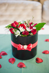 High angle view of red roses on table