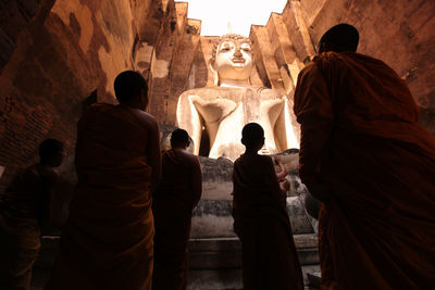 Rear view of people in temple