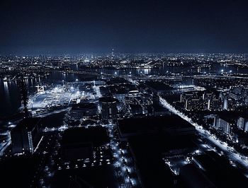 Illuminated cityscape at night