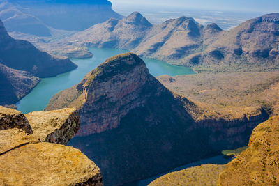 Panoramic view of lake and mountains against sky