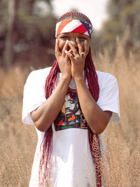 Young woman wearing hat