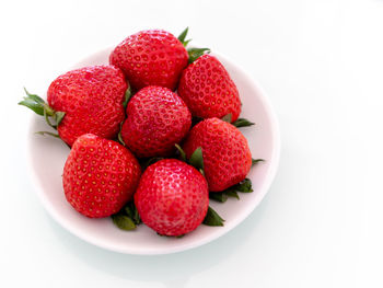 High angle view of strawberries in bowl