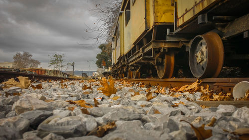 Train on railroad track against sky