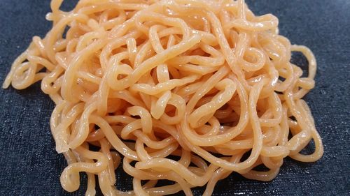 High angle view of pasta in plate on table