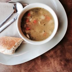 Close-up high angle view of soup in bowl at table