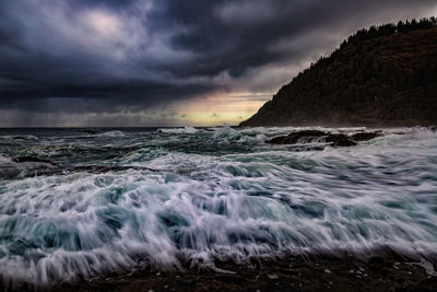 Scenic view of sea against sky at sunset