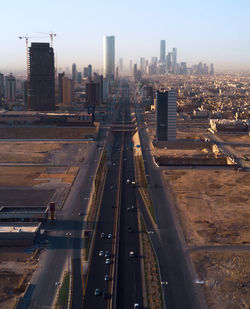 High angle view of street amidst buildings in city