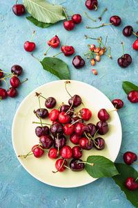 High angle view of fruits in plate on table