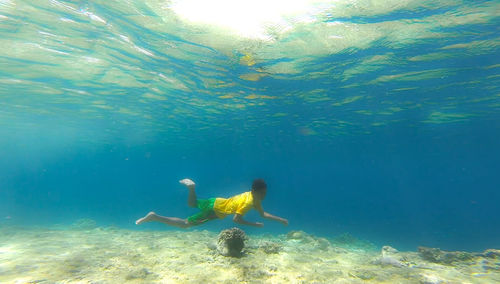 Man swimming in sea