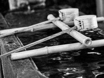 Close-up of cross on wood