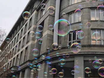 Close-up of bubbles against rainbow
