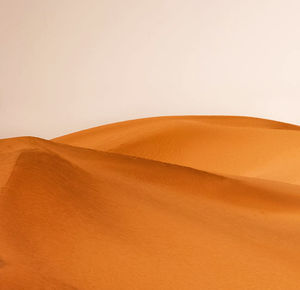 Scenic view of desert against clear sky