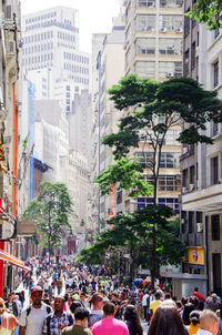 People walking on city street