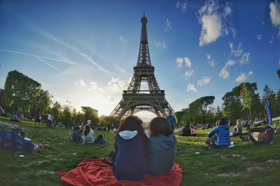 People at champ de mars with eiffel tower in background