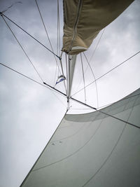 Low angle view of sailboat against sky