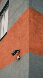 Low section of security camera on wall