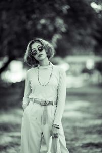 Portrait of woman standing outdoors