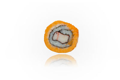 Close-up of sushi against white background