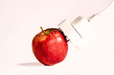 Close-up of apple against white background