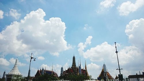 Low angle view of built structure against cloudy sky