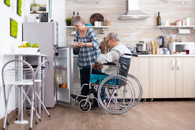 People standing on tiled floor