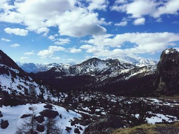 Scenic view of snowcapped mountains against sky