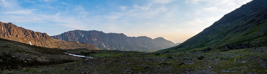 Scenic view of mountains against sky during sunset