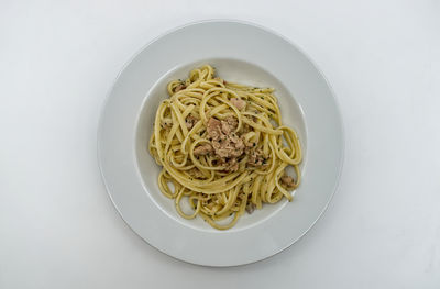 High angle view of pasta in plate on table