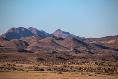 Scenic view of desert against clear sky