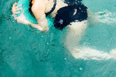 Woman swimming in water