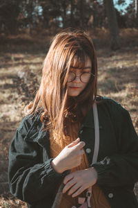 Young woman looking at camera