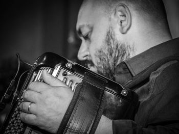 Man playing music outdoors