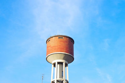 Low angle view of water tower against sky