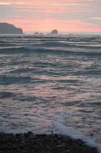 Scenic view of sea against sky during sunset