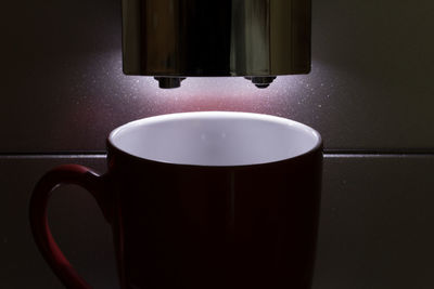 Close-up of coffee cup on table
