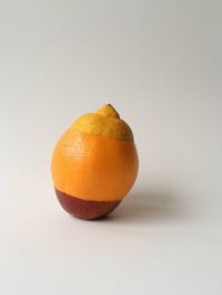 Close-up of fruit against white background