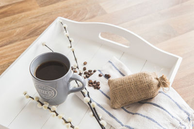 High angle view of coffee cup on table