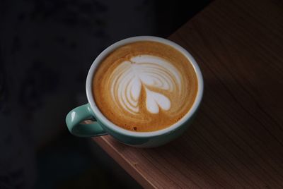 High angle view of cappuccino on table