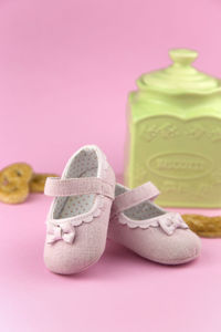 Close-up of shoes on table