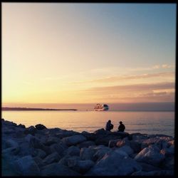 Scenic view of sea at sunset