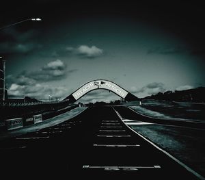 View of bridge in city against sky