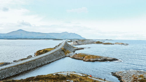 Bridge over sea against sky