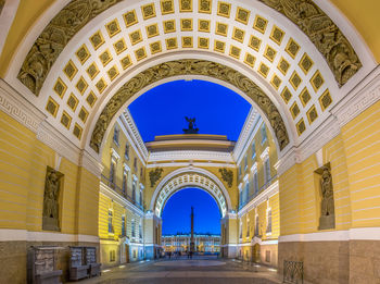 Interior of historic building against clear sky at dusk