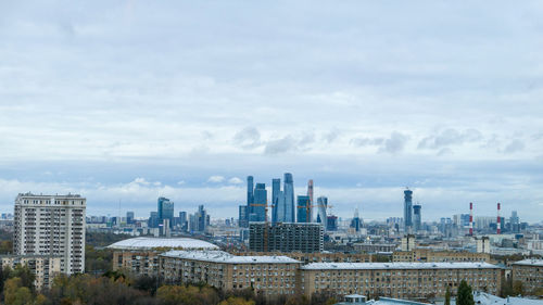 Panoramic view of autumn cityscape of moscow under dramatic cloudy sky