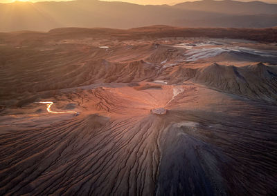 High angle view of sun shining over land