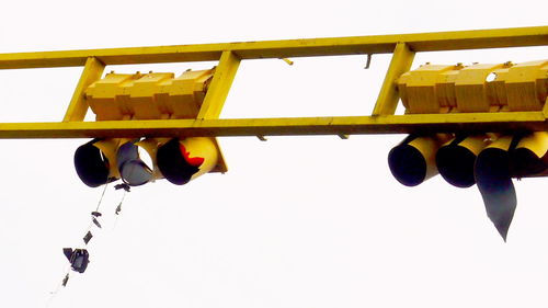 Low angle view of hanging against sky