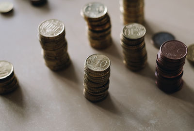 High angle view of coins on table