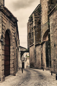 Old historic building against sky in city